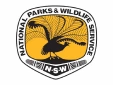 Logo of the National Parks & Wildlife Service (NSW), featuring a black silhouette of a bird with fanned feathers on an orange background, encircled by the organization's name in a shield-like shape.